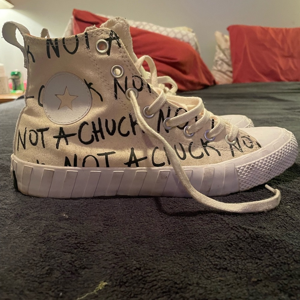 Converse High-Tops with Black Text Design